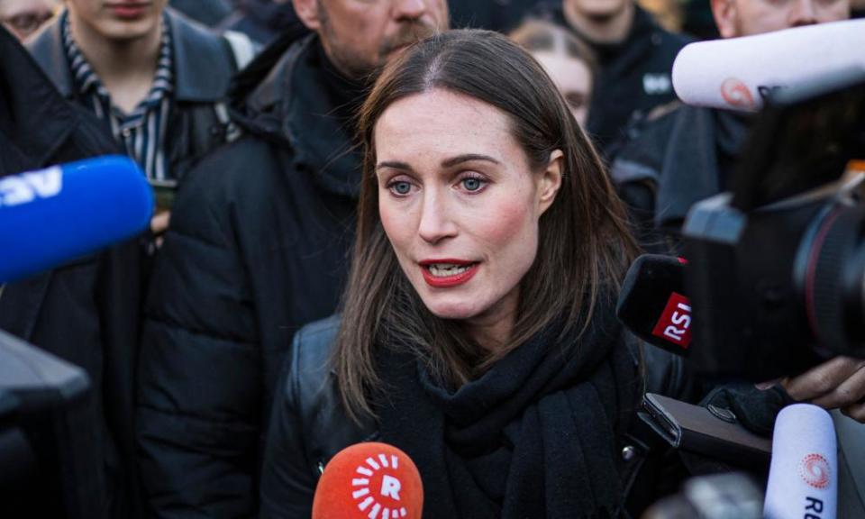 Sanna Marin speaks to the media during an elections rally in Helsinki