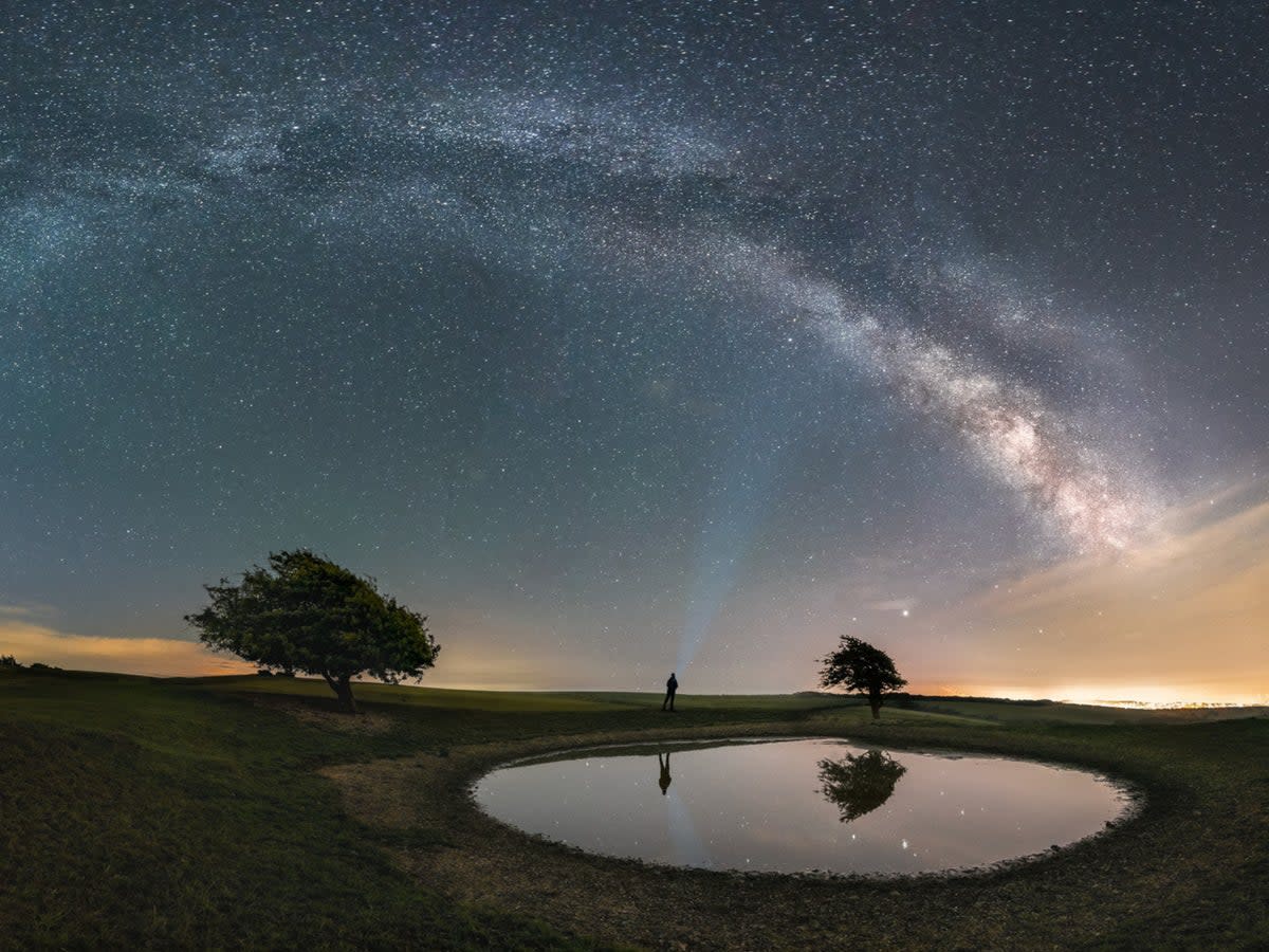 Panoramic photo of the Milky Way over the dew pond at Ditchling Beacon (Pablo Rodriguez / SDNPA)