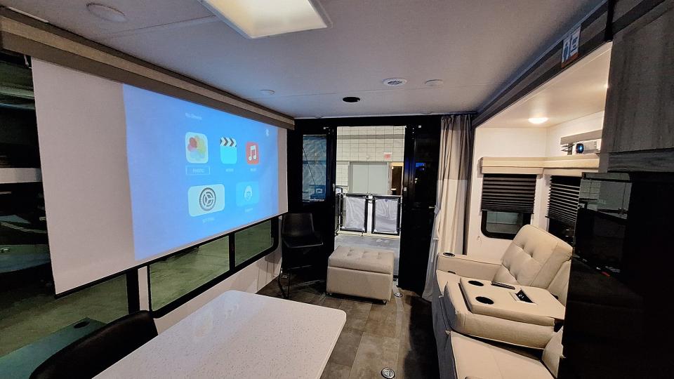 A camper with an 80-inch projector television is on display this week at the Pittsburgh RV Show in Pittsburgh.