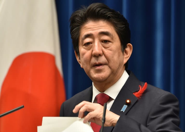 Japan's Prime Minister Shinzo Abe holds a press conference at his official residence in Tokyo, on October 6, 2015