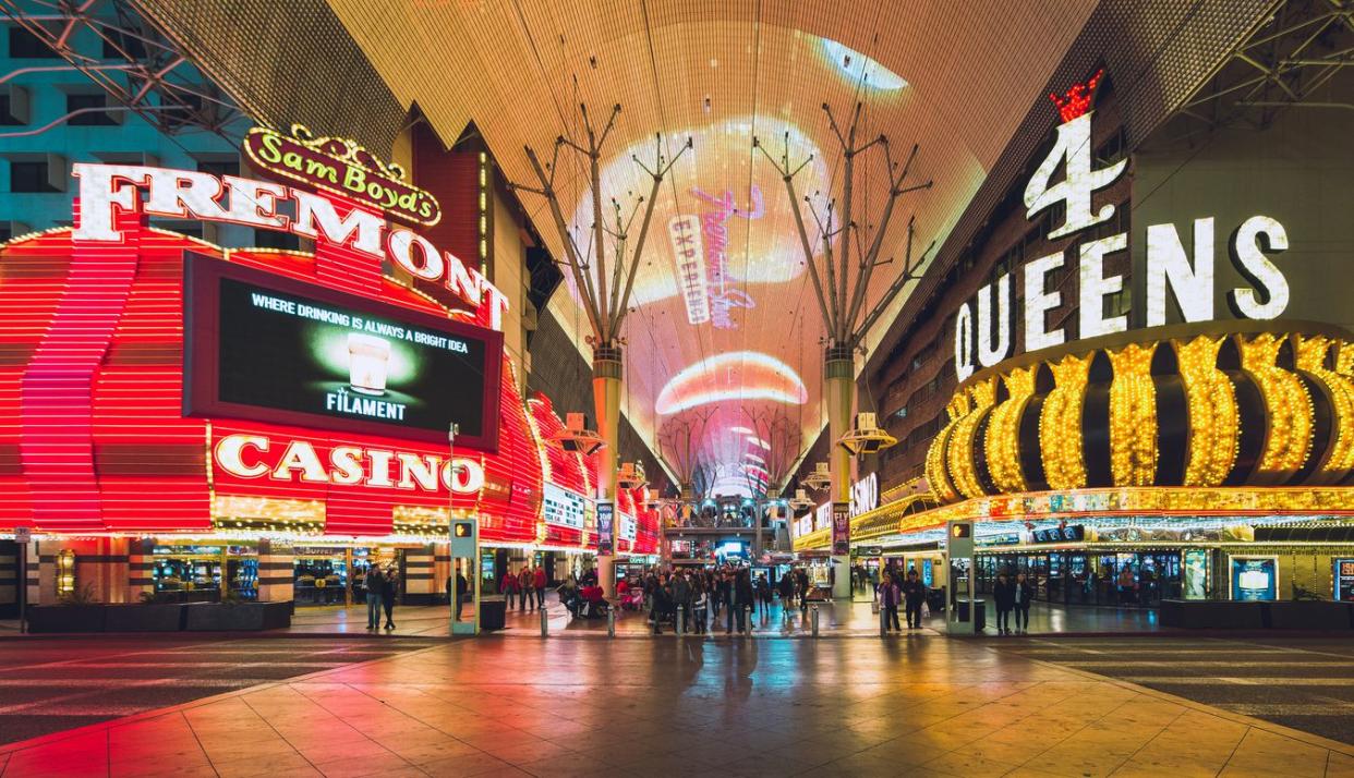 Tourists enjoying the nightlife on the famous Fremont Street promenade Las Vegas, Navada.