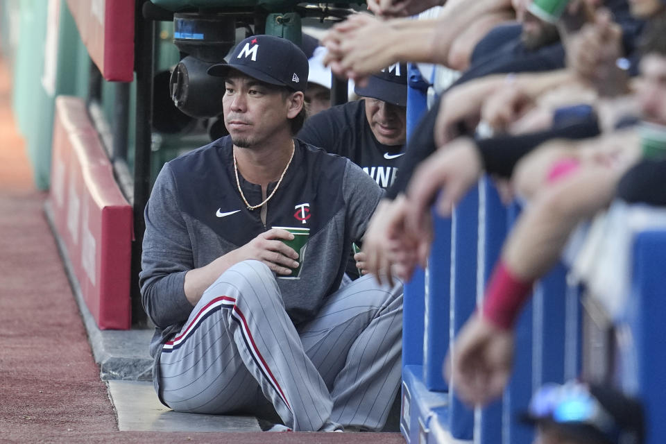 Minnesota Twins' Kenta Maeda watches from the dugout steps in the first inning of a baseball game against the Cleveland Guardians, Tuesday, Sept. 5, 2023, in Cleveland. (AP Photo/Sue Ogrocki)