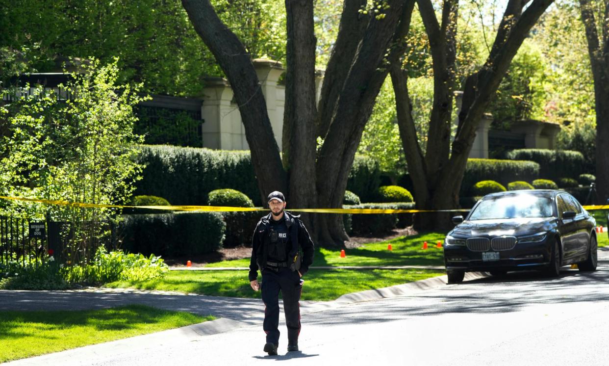 <span>Police at Drake’s home in Torontoon 7 May 2024. </span><span>Photograph: Nathan Denette/AP</span>