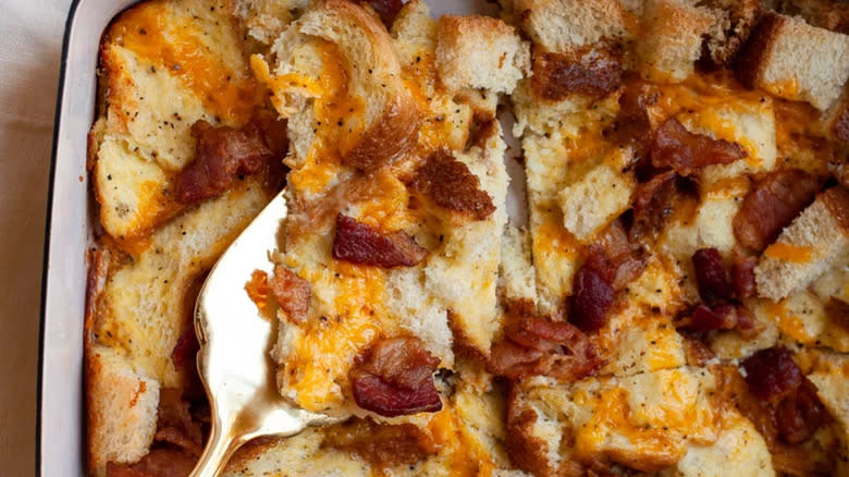 Bread, cheese and bacon in dish