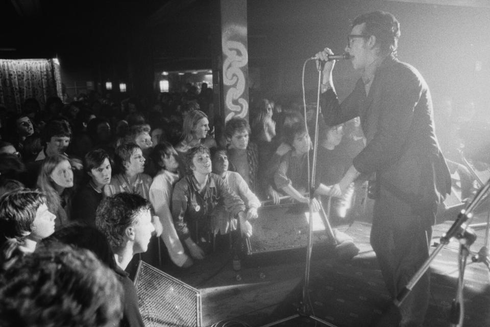 Elvis Costello performing with English pop group Elvis Costello And The Attractions