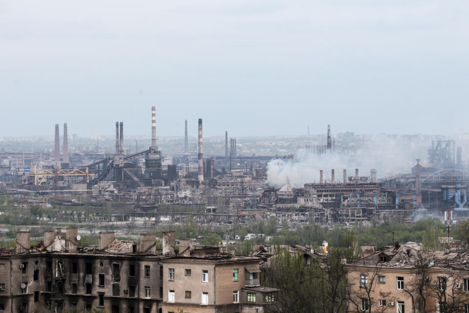 Smoke rises from the Metallurgical Combine Azovstal in Mariupol, in territory under the government of the Donetsk People's Republic, eastern in Mariupol, Ukraine, Thursday, May 5, 2022. Heavy fighting is raging at the besieged steel plant in Mariupol as Russian forces attempt to finish off the city's last-ditch defenders and complete the capture of the strategically vital port. (AP Photo)