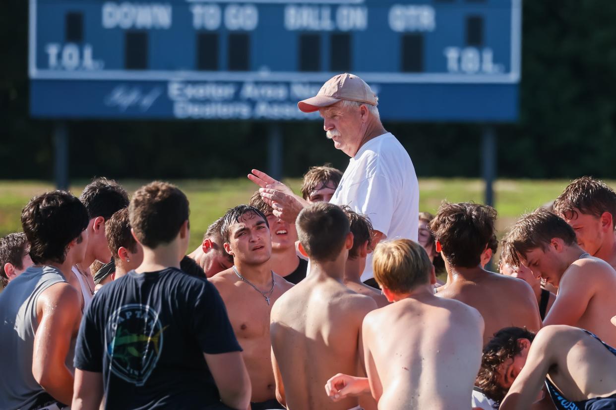 Exeter High School head football coach Bill Ball has the Blue Hawks sitting atop the Division I East standings.