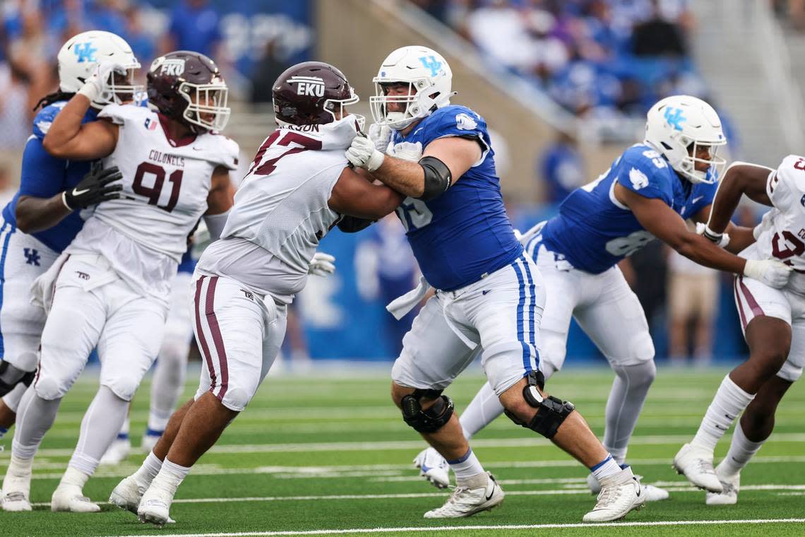 Kentucky right guard Eli Cox (75) blocks an Eastern Kentucky defender during UK’s 28-17 win over the Colonels last Saturday. After grading out at 86% for the game, Cox was named SEC Offensive Lineman of the Week for his play.