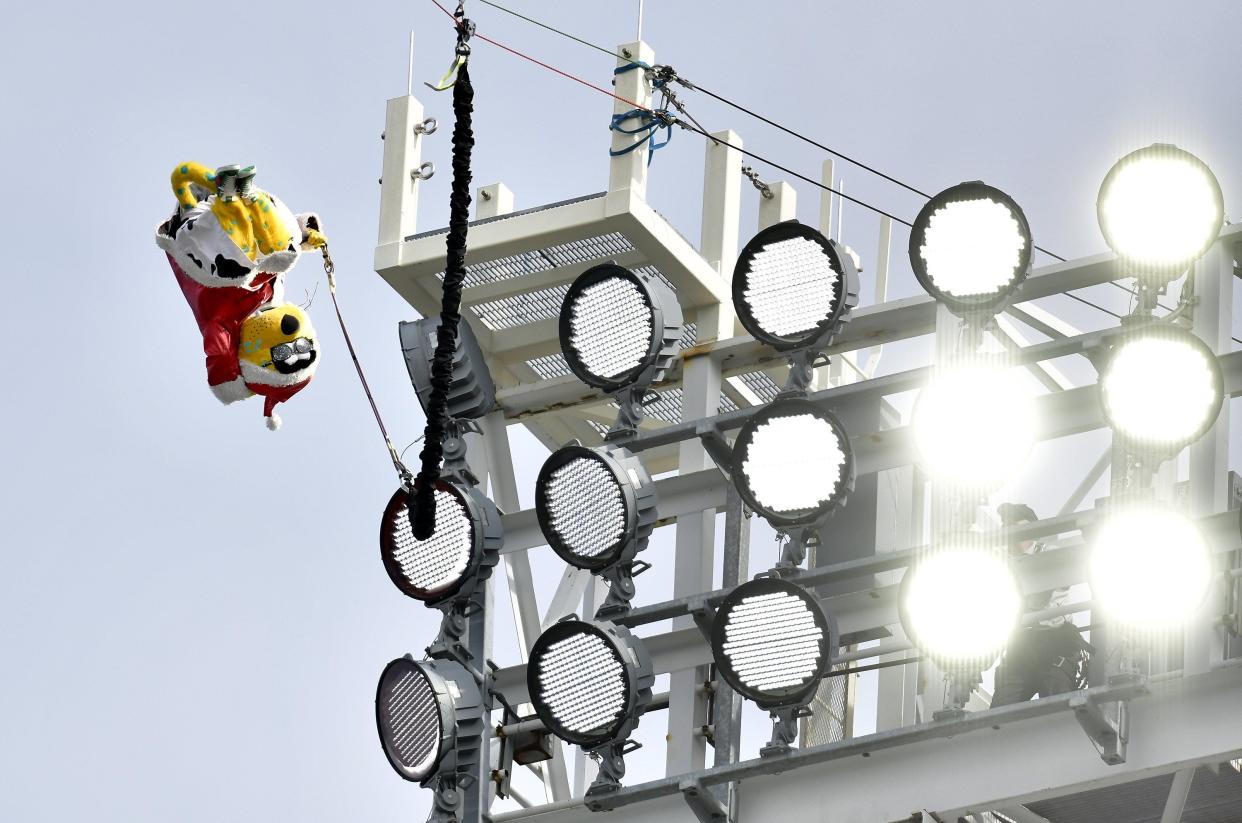 Wearing his Santa suit, Jaxson de Ville makes his pre game leap from a light tower at TIAA Bank Field before last year's game against Houston on Dec. 19.