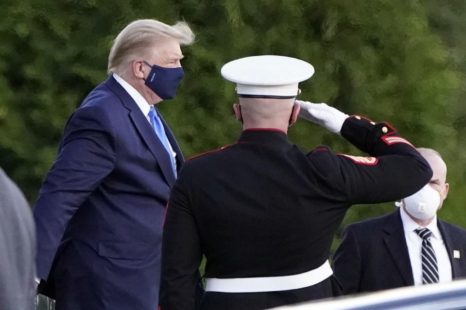 President Trump arrives at Walter Reed National Military Medical Center in Bethesda, Md., on Friday.