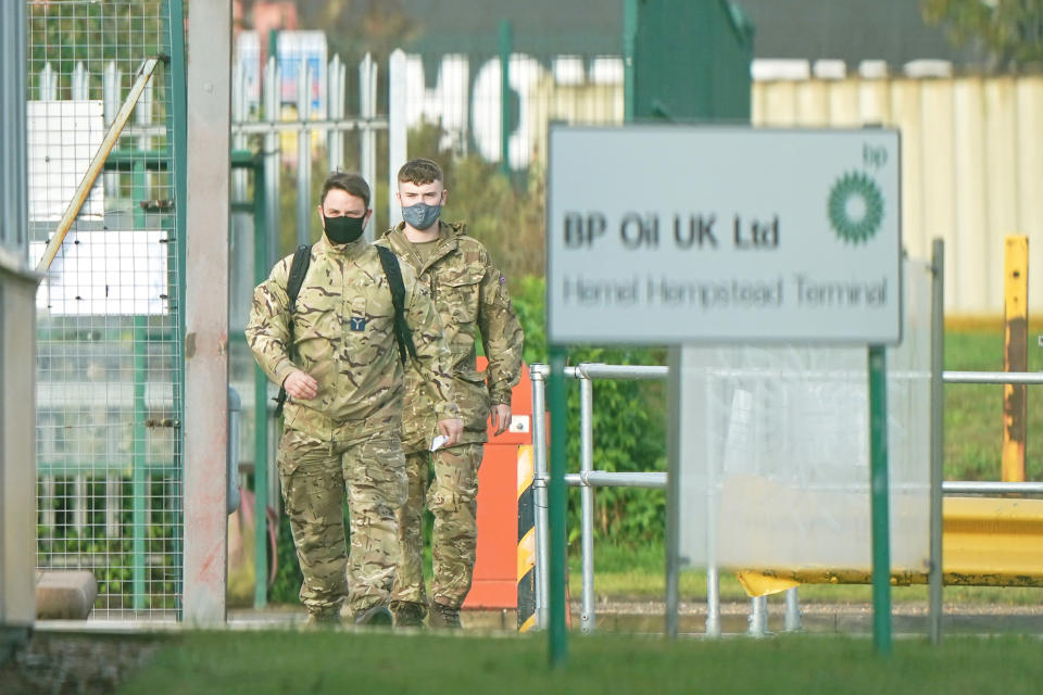 Members of the armed forces at Buncefield oil depot, known as the Hertfordshire Oil Storage Terminal, in Hemel Hempstead. Picture date: Monday October 4, 2021.