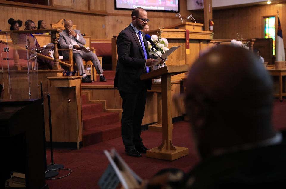 El Paso County Commissioner David Stout reads an El Paso County resolution on Martin Luther King Jr. Day at Mount Zion Baptist Church on Sunday, Jan. 14, 2024.