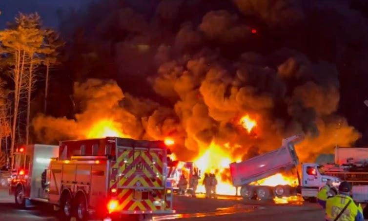 Smoke billowing over oil tanker fire