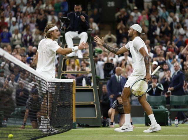 Stefanos Tsitsipas (left) and Nick Kyrgios shake hands