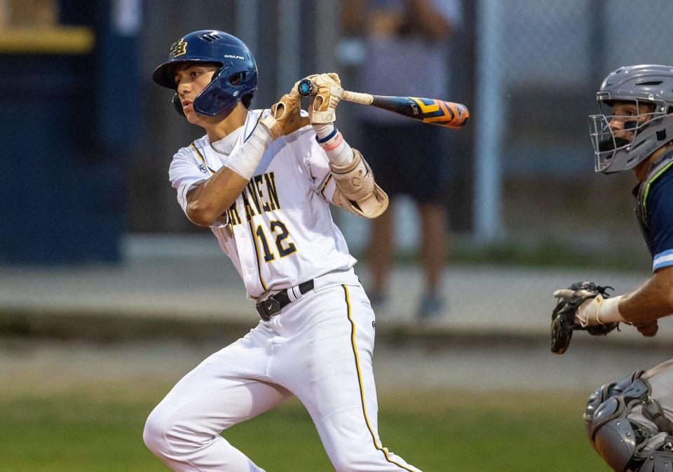 Winter Haven 2B (12) Gerardo Sandoval hits a single against Newsome during a 7A District 6 baseball tournament at Winter Hven High School in Winter Haven Fl. Tuesday April 30, 2024. Ernst Peters/The Ledger