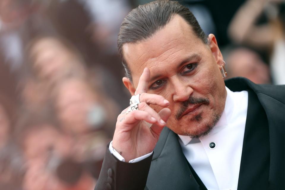 CANNES, FRANCE - MAY 16: Johnny Depp attends the "Jeanne du Barry" Screening & opening ceremony red carpet at the 76th annual Cannes film festival at Palais des Festivals on May 16, 2023 in Cannes, France. (Photo by Vittorio Zunino Celotto/Getty Images)