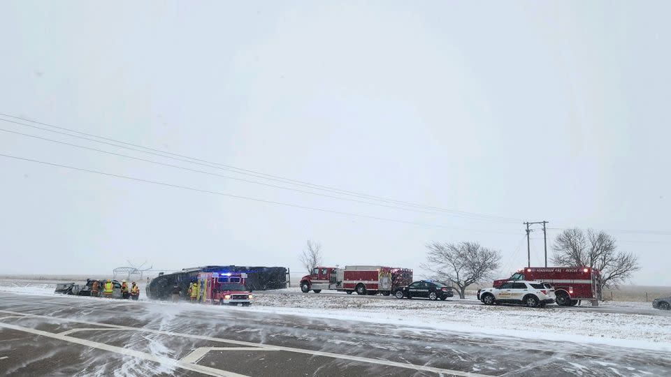 Nebraska first responders work along a slick I-80 on Monday between Grand Island and Lincoln. - Nebraska State Patrol