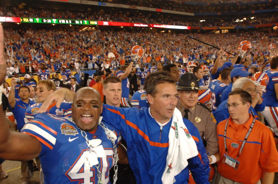 The Netflix documentary, "Swamp Kings," outlines the six-year UF coaching tenure of Urban Meyer, seen here celebrating his first national championship with linebacker Brandon Siler (40). The documentary has some compelling moments, but didn't give a complete picture by minimizing a lot of Meyer's disciplinary issues with the program.