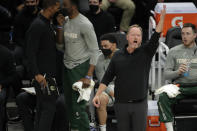 Milwaukee Bucks' head coach Mike Budenholzer gestures to his team during the first half of Game 5 of the NBA Eastern Conference Finals against the Atlanta Hawks Thursday, July 1, 2021, in Milwaukee. (AP Photo/Aaron Gash)