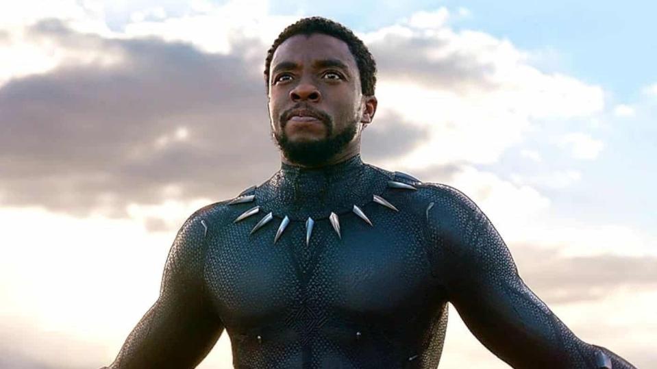 Chadwick Boseman looks into the distance as Black Panther