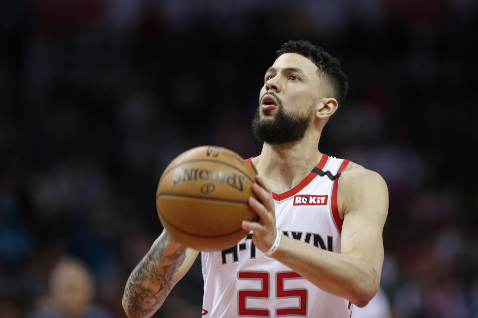 Houston Rockets guard Austin Rivers prepares to shoot a free throw. 