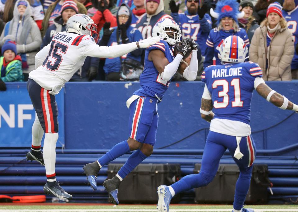 Bills cornerback Tre’Davious White intercepts this pass win the end zone intended for Patriots receiver Nelson Agholor. 