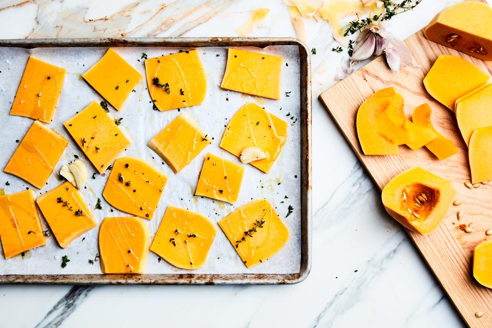 Roast butternut squash in big planks with garlic and thyme to re-create one of our favorite restaurant sandwiches.