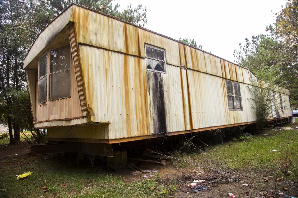 A trailer in a secluded hillside community Lowndes County, Alabama, pipes bathroom waste onto the ground. (Photo: ANNA LEAH FOR HUFFPOST)