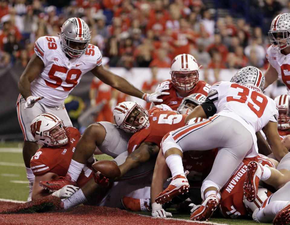 Wisconsin running back Chris James (5) scores during the second half of the Big Ten championship NCAA college football game against Ohio State, Saturday, Dec. 2, 2017, in Indianapolis. (AP Photo/AJ Mast)
