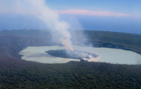 Smoke and ash emanates from the Manaro Voui volcano located on Vanuatu's northern island Ambae in the South Pacific, October 1, 2017. REUTERS/Ben Bohane