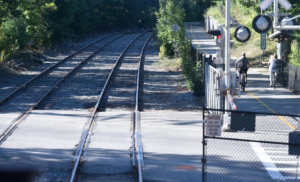 The Falmouth Secondary train line run parallel to a section of a bike path in North Falmouth.