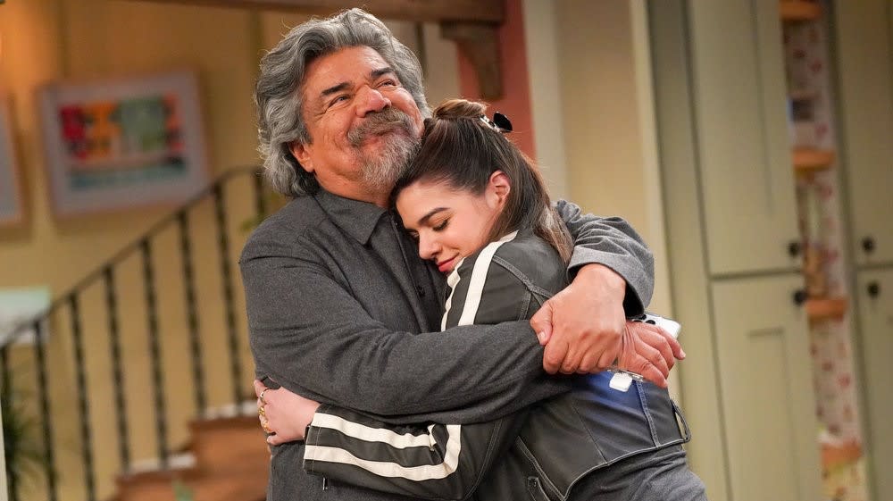  George Lopez and Mayan Lopez hugging on Lopez vs Lopez. 