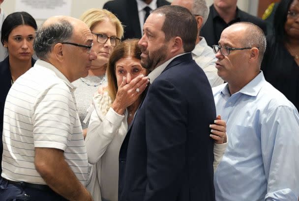 PHOTO: Linda Beigel Schulman, center, mother of Scot Beigel, is comforted by other victims family during the penalty phase of the trial for Marjory Stoneman Douglas High School shooter Nikolas Cruz on July 19, 2022 in Fort Lauderdale, Fla. (Pool/Getty Images)