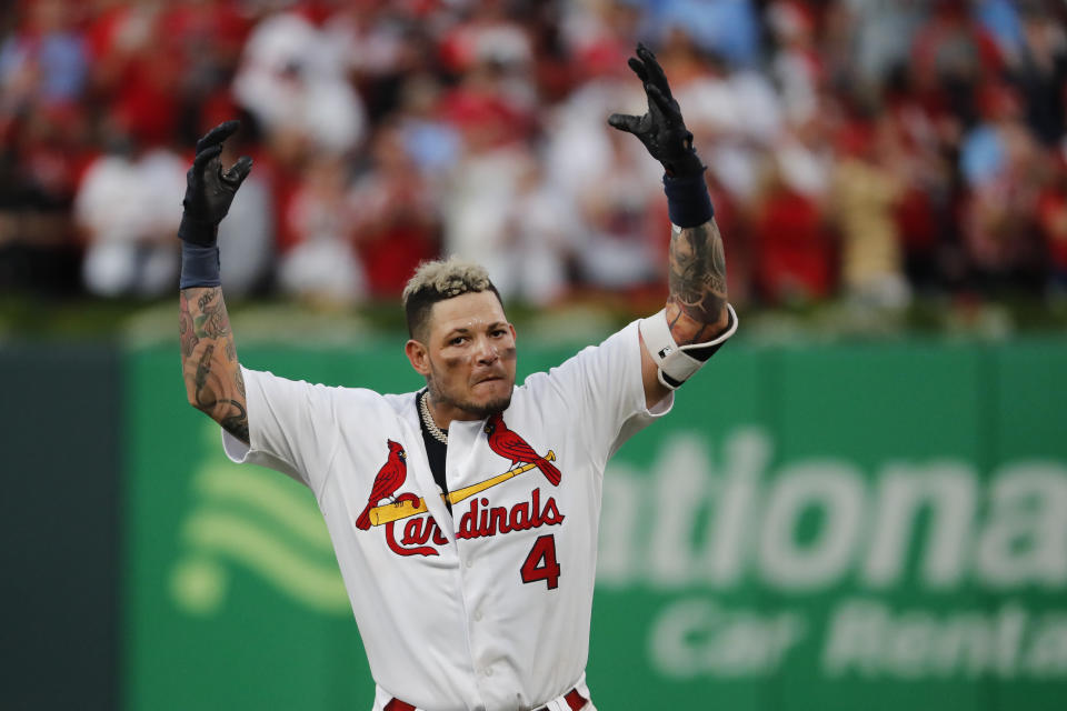 St. Louis Cardinals' Yadier Molina celebrates after hitting a sacrifice fly to score Kolten Wong and defeat the Atlanta Braves in Game 4 of a baseball National League Division Series, Monday, Oct. 7, 2019, in St. Louis. (AP Photo/Jeff Roberson)