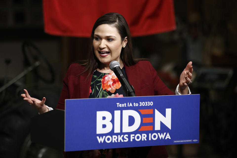 FILE - In this Jan. 3, 2020 file photo, Rep. Abby Finkenauer, D-Iowa, introduces Democratic presidential candidate, former Vice President Joe Biden during a campaign event in Independence, Iowa. President-elect Joe Biden is eyeing several Democrats who lost congressional reelection races last month for key positions in his administration. They include outgoing Reps. Abby Finkenauer of Iowa and Donna Shalala of Florida and Sen. Doug Jones of Alabama. (AP Photo/Patrick Semansky)