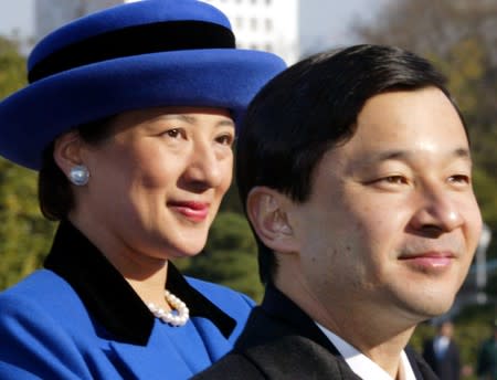 FILE PHOTO: Japan's Crown Princess Masako is seen with her husband Crown Prince Naruhito in Tokyo