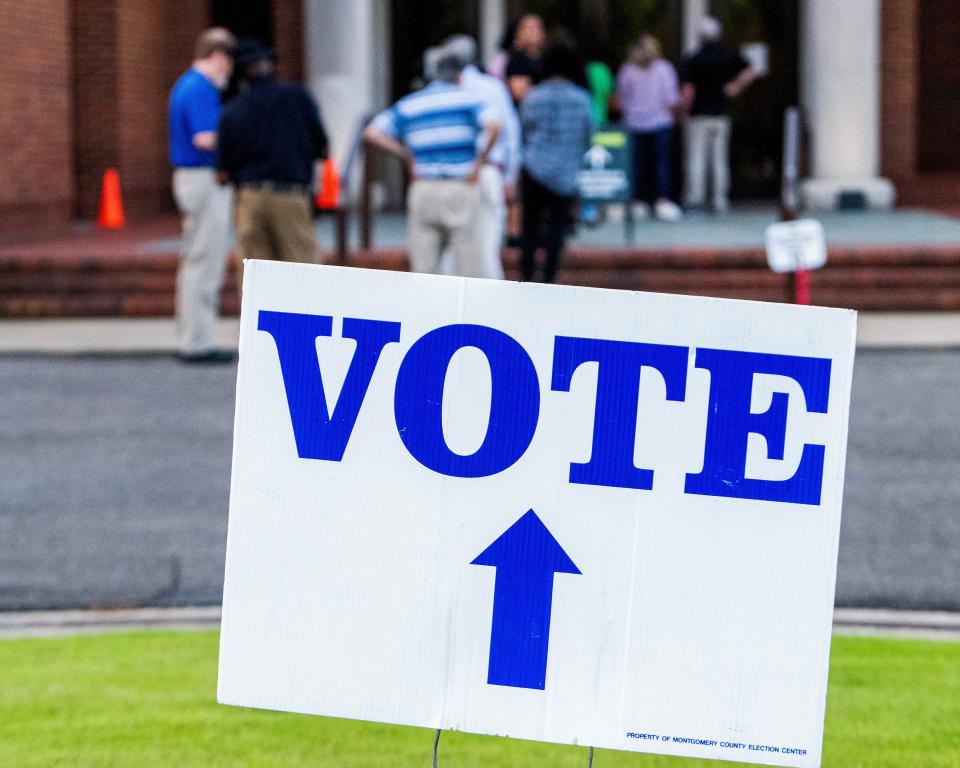 Voters wait on the Montgomery Museum of Fine Arts voting precinct to open as municipal election day begins in Montgomery, Ala., on Tuesday August 22, 2023.