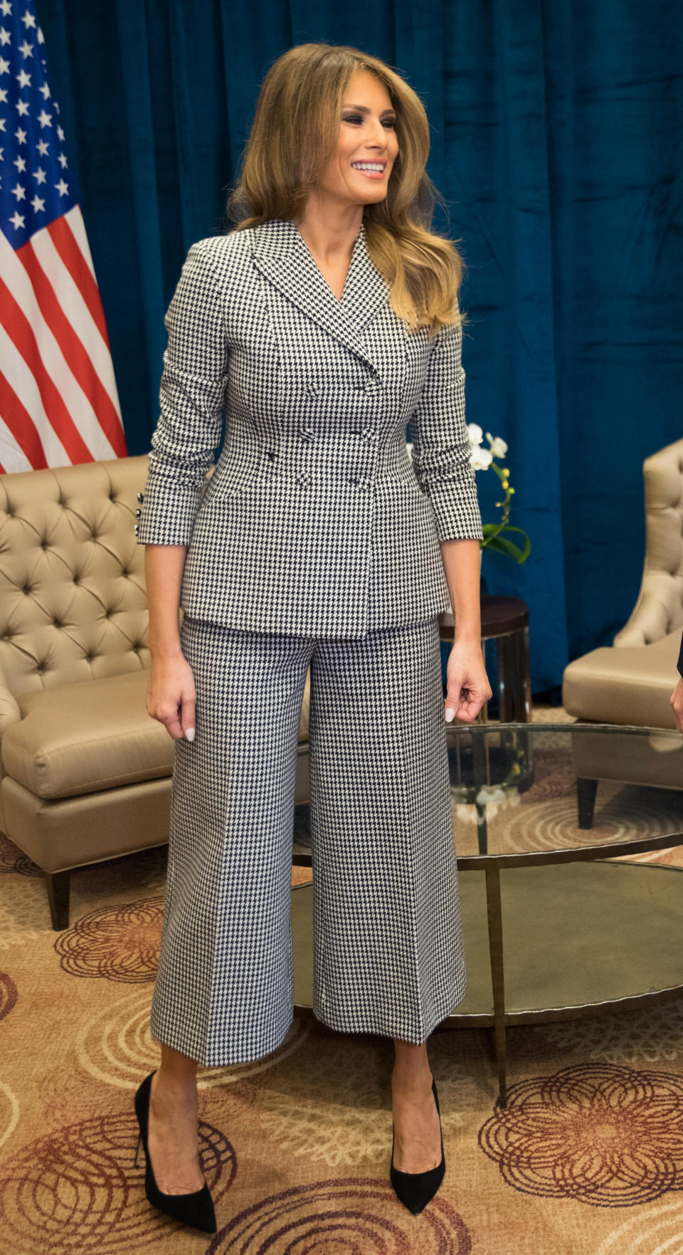 Trump looks rather uncomfortable in a head-to-toe Dior look. (Photo: Getty Images)