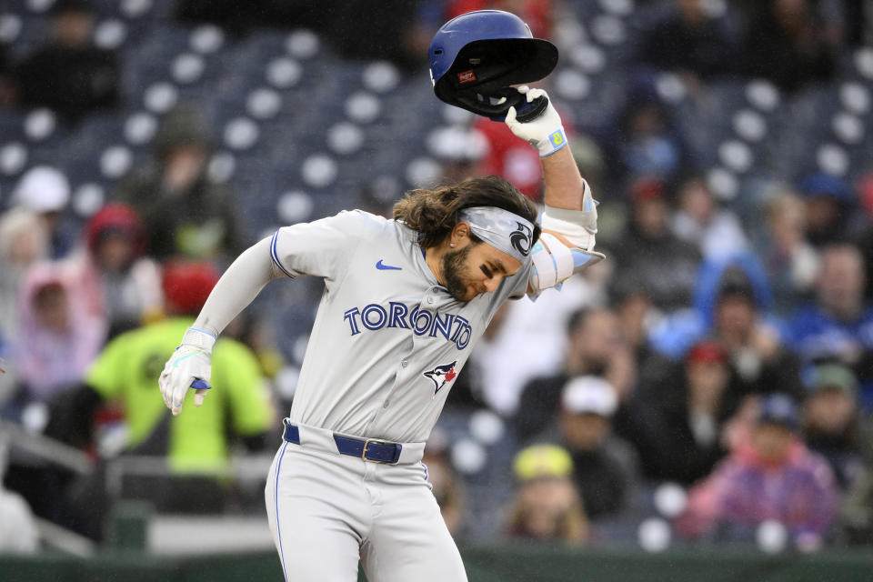 Toronto Blue Jays' Bo Bichette reacts after he struck out during the fifth inning of a baseball game against the Washington Nationals, Saturday, May 4, 2024, in Washington. Bichette was ejected from the game. (AP Photo/Nick Wass)