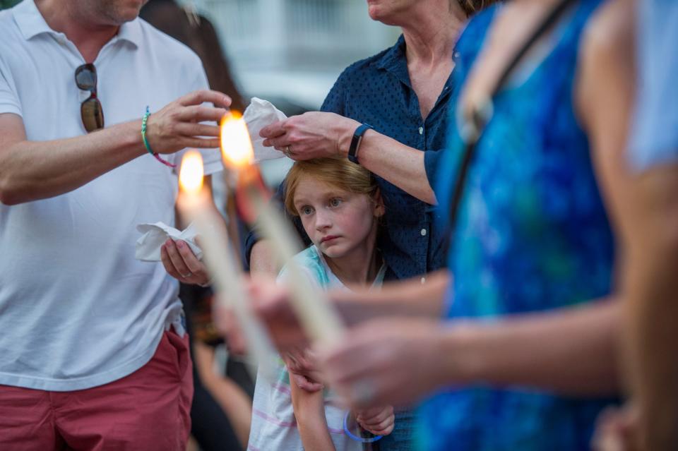Mourners remember 5 people slain at the Capital Gazette in Annapolis, Md.