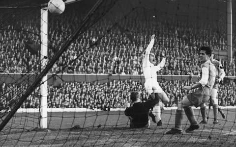 Alfredo Di Stefano scores for Real Madrid during the legendary 7-3 demolition of Eintracht Frankfurt in 1960 - Credit: Getty