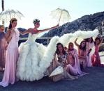 <p>For the ceremony, Alexander McQueen's Sarah Burton designed an incredible ruffled gown, using 500 meters of organza for the train, to mimic the sea and rocks of Capri.</p>