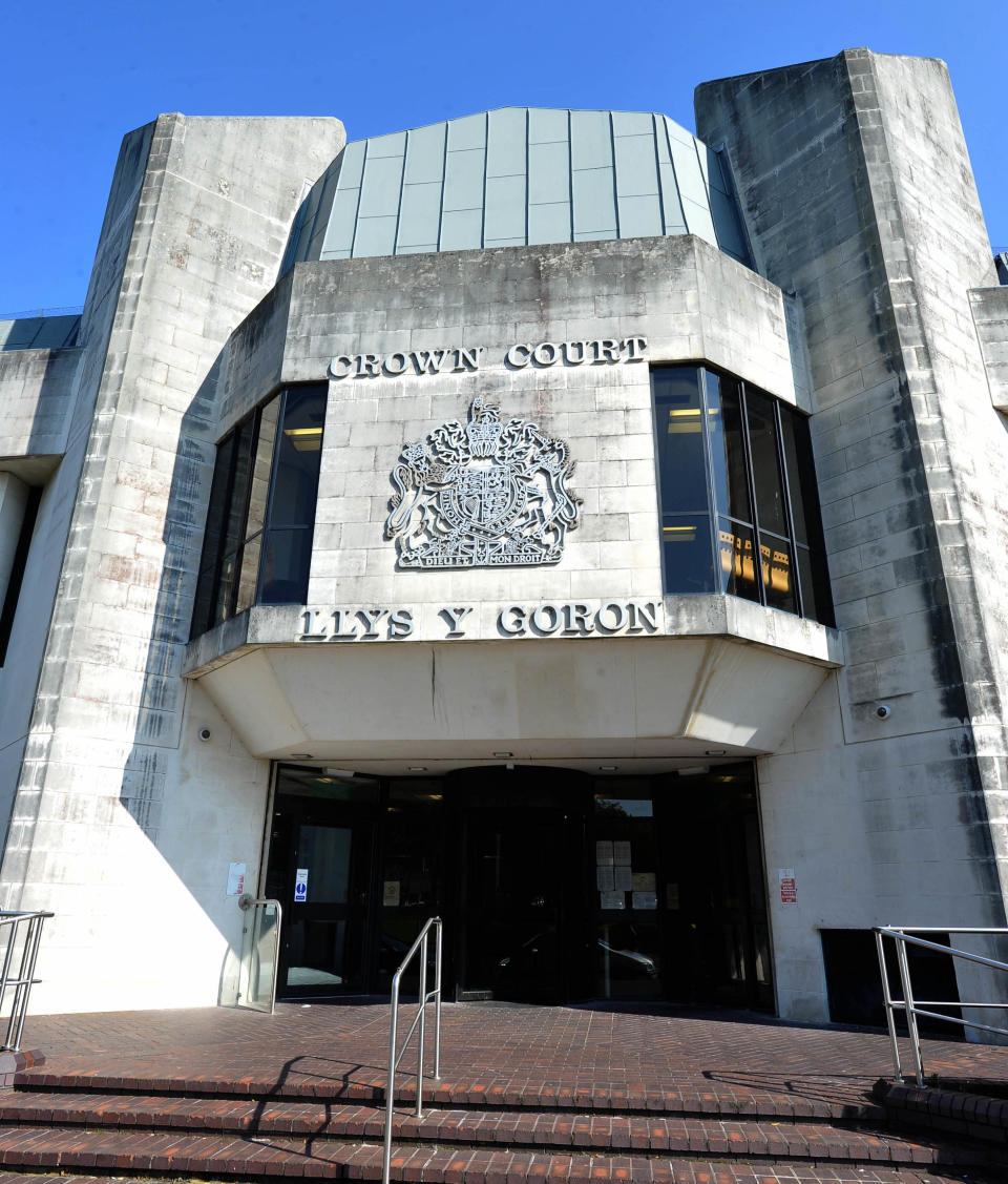 A taxi driver was repeatedly stabbed and left for dead by two teenage passengers in a row over a Â£6 fare. 

Kyle Parsons and Ludvik Rac carried out the vicious attack on the 58-year-old in Swansea on June 29 this year.

Caption: Swansea Crown Court

