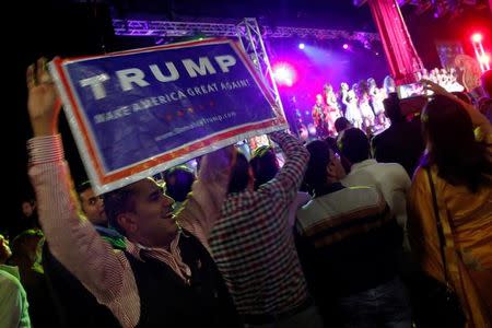 People wait for Republican presidential nominee Donald Trump to take the stage at a Bollywood-themed charity concert put on by the Republican Hindu Coalition in Edison, New Jersey, U.S. October 15, 2016. REUTERS/Jonathan Ernst