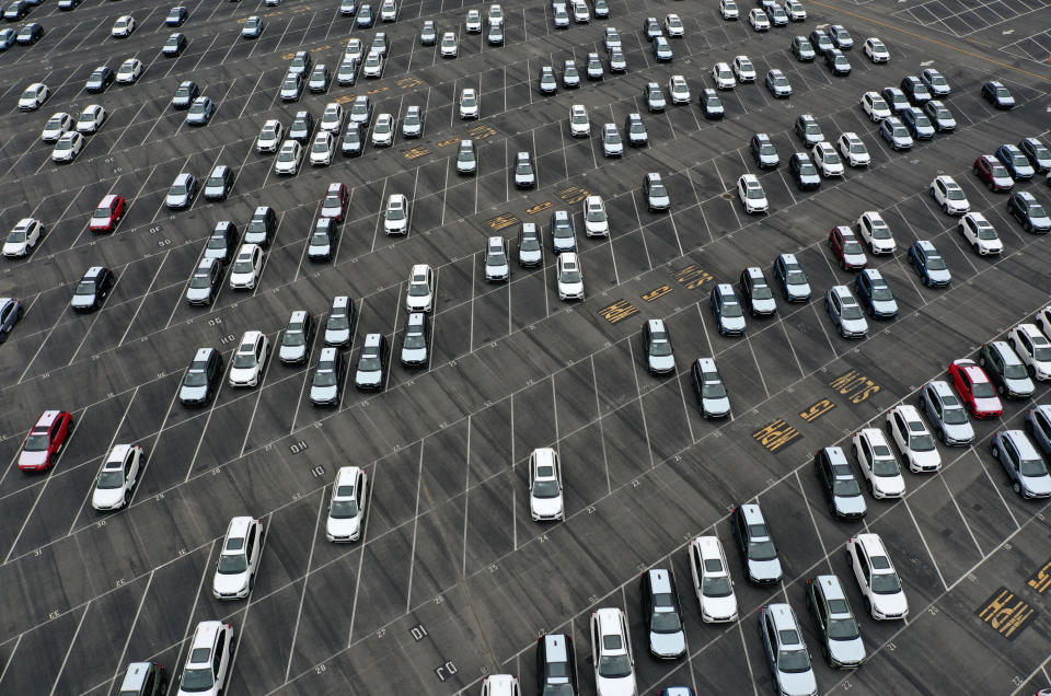 RICHMOND, CALIFORNIA - MAY 14: In an aerial view, brand new Subaru cars sit in half empty storage lot at Auto Warehouse Co. on May 14, 2021 in Richmond, California. New cars are becoming hard to find and the prices have surged as dealerships are having trouble with inventory due to the global chip shortage and global supply chain issues brought on by COVID-19-related complications. (Photo by Justin Sullivan/Getty Images)