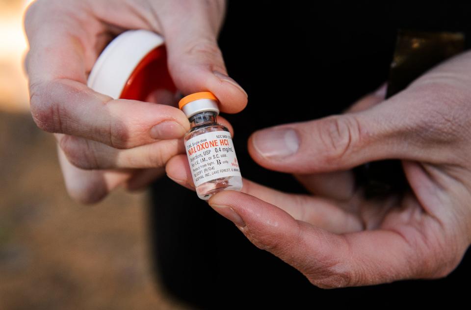 A small bottle of naloxone, an opioid overdose reversal drug.