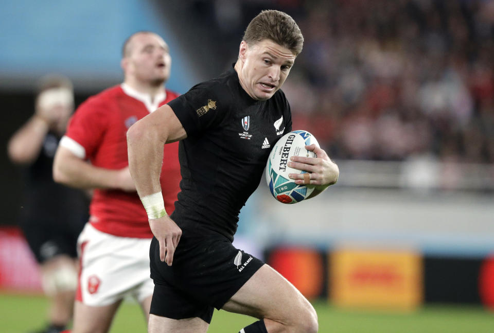 FILE - In this Nov. 1, 2019, file photo, New Zealand's Beauden Barrett runs to score a try during the Rugby World Cup bronze final game against Wales at Tokyo Stadium, in Tokyo. New All Blacks head coach Ian Foster opted for the in-form Richie Mo'unga at No. 10 ahead of the incumbent Barrett, a two-time World Rugby Player of the Year, who will start at fullback in the first Bledisloe Cup test against Australia, Sunday, Oct. 11, 2020. (AP Photo/Mark Baker, File)