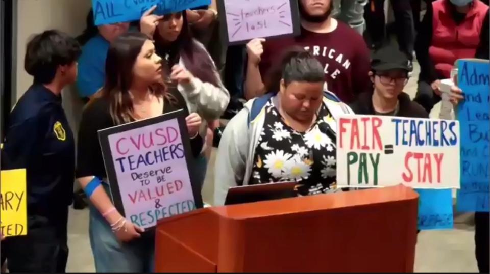 Coachella Valley High School students call for better teacher pay and improved school safety to the Board of Trustees in Thermal, Calif., Feb. 9, 2023.