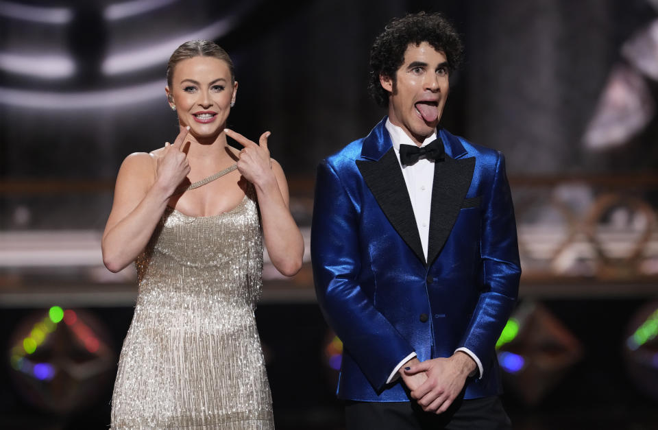 Pre-show hosts Julianne Hough, left, and Darren Criss speak at the 75th annual Tony Awards on Sunday, June 12, 2022, at Radio City Music Hall in New York. (Photo by Charles Sykes/Invision/AP)