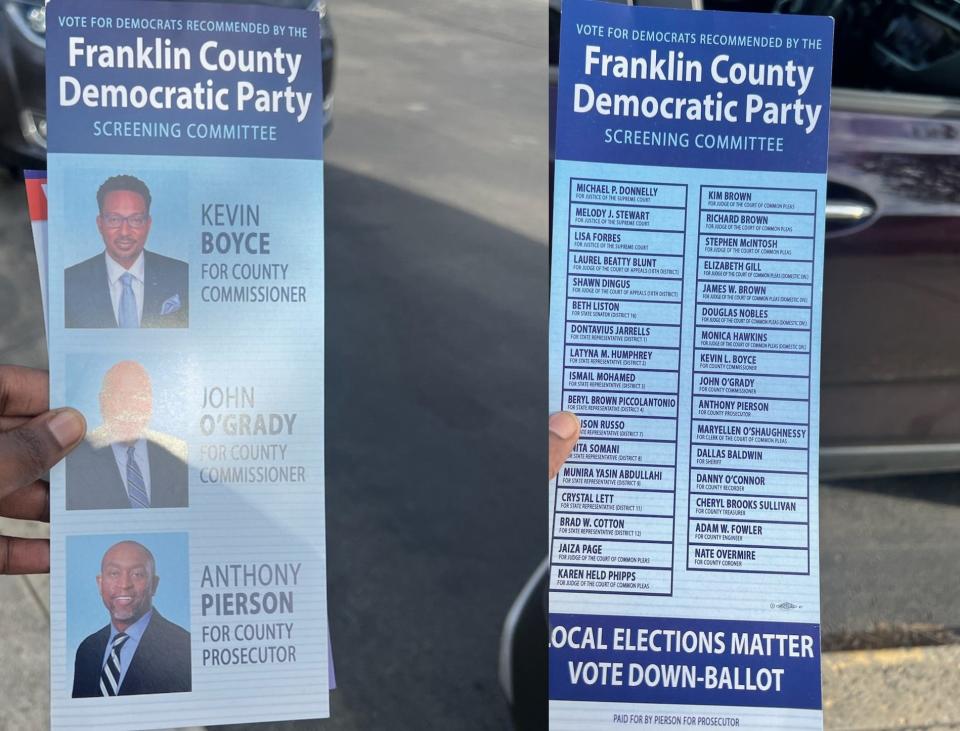 Images of both sides of Franklin County Prosecutor candidate Anthony Pierson's campaign flyers resembling county Democratic party endorsement slate cards that were being handed out at polling locations on Tuesday. These images were included in a press release from candidate Shayla Favor's campaign, which cried foul over the move.